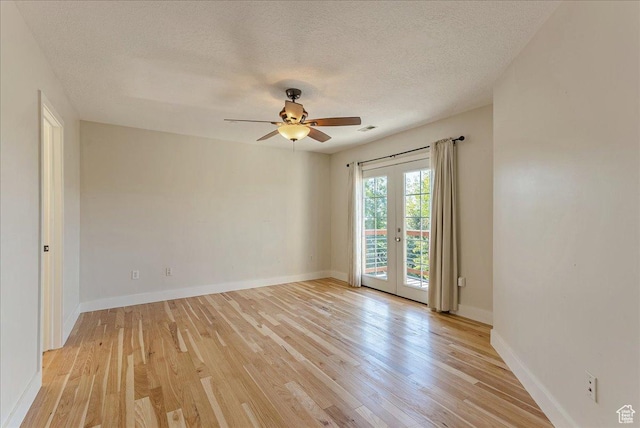 1794 E Longbranch Dr, Draper, UT 84020 - empty room with french doors, ceiling fan, light wood-type flooring, and a textured ceiling