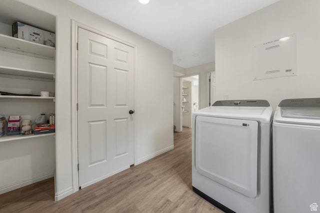 7839 N Apache Ln E, Eagle Mountain, UT 84005 - washroom with washer and clothes dryer and light wood-style flooring