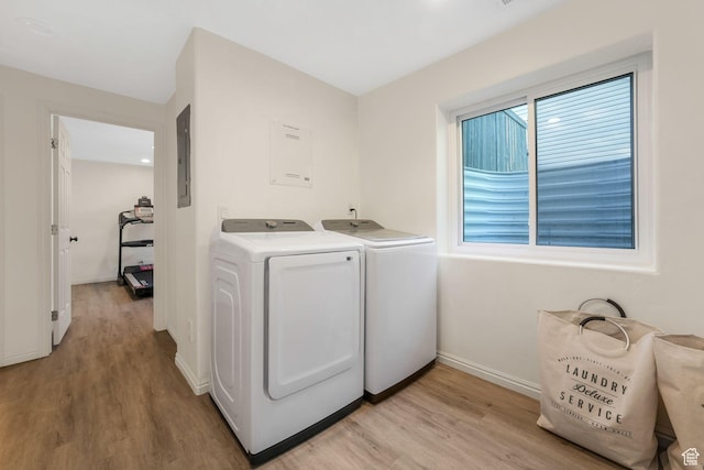7839 N Apache Ln E, Eagle Mountain, UT 84005 - laundry room with independent washer and dryer, light wood-type flooring, and electric panel