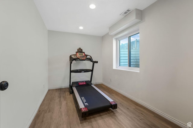 7839 N Apache Ln E, Eagle Mountain, UT 84005 - exercise area featuring wood finished floors and recessed lighting
