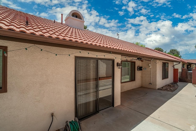 301 S 1200 E Unit 64, St George, UT 84790 - rear view of property with stucco siding, a patio, and a tile roof