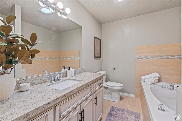 1673 W 9775 S, South Jordan, UT 84095 - bathroom featuring vanity, a garden tub, wood finished floors, and a textured ceiling