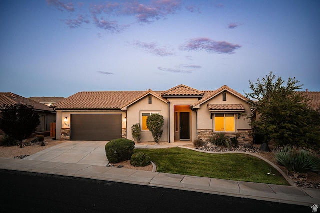 1060 N Ocotillo Dr, Washington, UT 84780 - mediterranean / spanish home with stone siding, a tile roof, and stucco siding