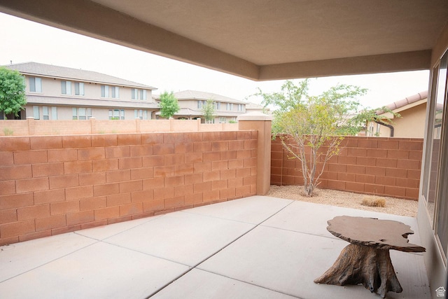 1060 N Ocotillo Dr, Washington, UT 84780 - fenced backyard with a patio