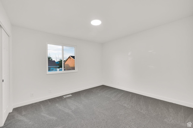 3042 W 8565 S, West Jordan, UT 84088 - unfurnished bedroom featuring dark colored carpet and a closet