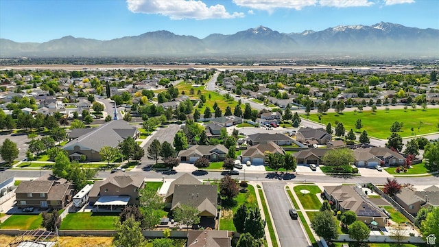 7414 S Regal Dr, West Jordan, UT 84081 - aerial view of residential area featuring a mountainous background