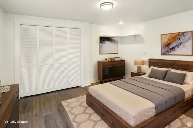 7414 S Regal Dr, West Jordan, UT 84081 - bedroom featuring wood finished floors and a closet