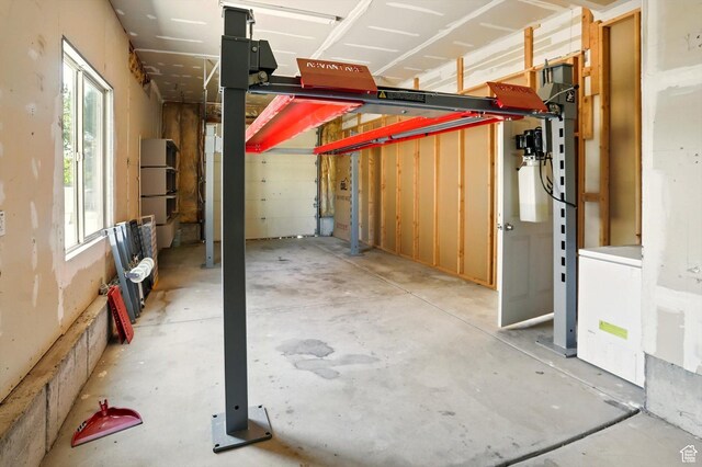 7414 S Regal Dr, West Jordan, UT 84081 - garage with freestanding refrigerator