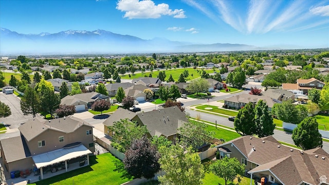 7414 S Regal Dr, West Jordan, UT 84081 - aerial perspective of suburban area with mountains