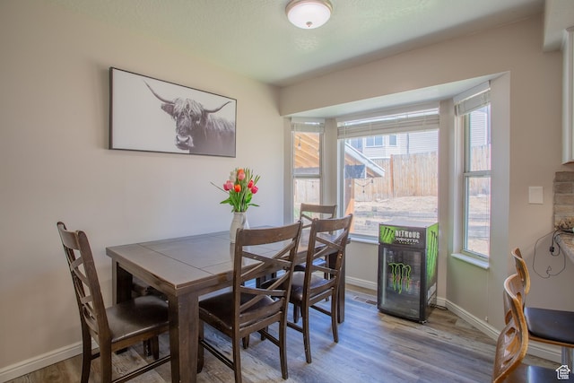 1211 E Spring Ridge Dr S, Sandy, UT 84094 - dining area with wood finished floors and baseboards