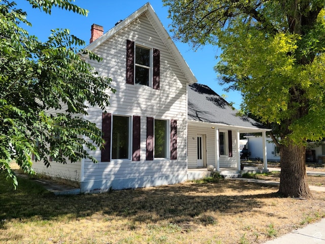 48 N Main St, Ephraim, UT 84627 - view of front facade with a porch and a chimney
