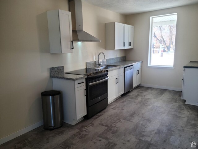 48 N Main St, Ephraim, UT 84627 - kitchen with wall chimney exhaust hood, electric stove, dishwasher, white cabinets, and a textured ceiling