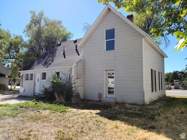 48 N Main St, Ephraim, UT 84627 - back of house with a chimney