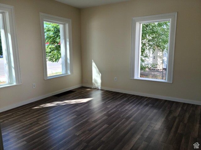 48 N Main St, Ephraim, UT 84627 - unfurnished room with dark wood finished floors and baseboards