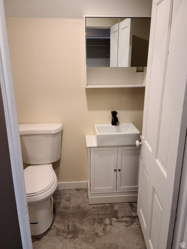 48 N Main St, Ephraim, UT 84627 - half bathroom featuring vanity and concrete floors
