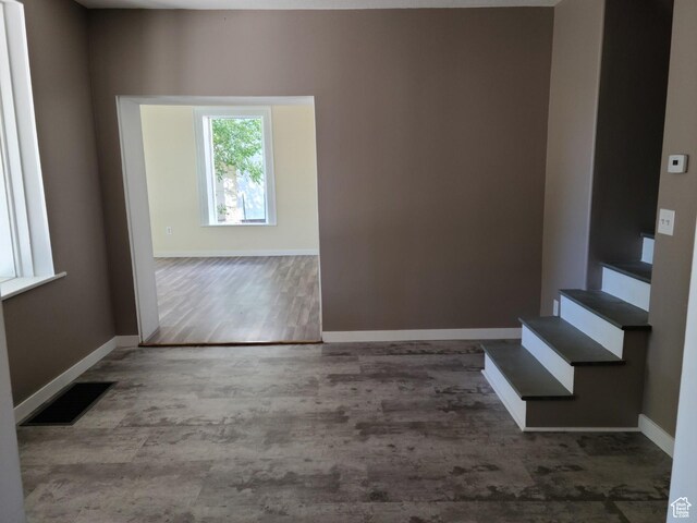 48 N Main St, Ephraim, UT 84627 - unfurnished room with wood finished floors and stairs