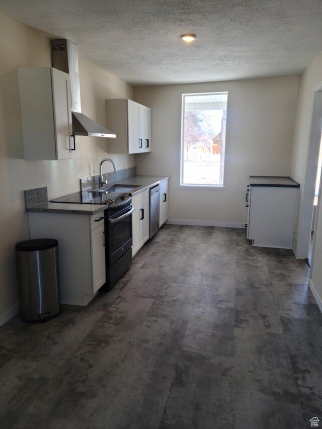 48 N Main St, Ephraim, UT 84627 - kitchen featuring electric stove, stainless steel dishwasher, wall chimney range hood, a textured ceiling, and white cabinets