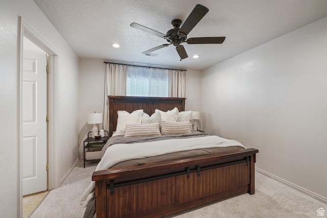 211 Greenfield Cir Unit 119, Heber City, UT 84032 - bedroom featuring light colored carpet, recessed lighting, ceiling fan, and a textured ceiling
