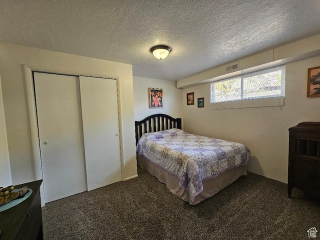 675 W 3300 N, Vernal, UT 84078 - carpeted bedroom featuring a closet and a textured ceiling