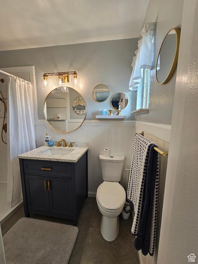675 W 3300 N, Vernal, UT 84078 - bathroom with a wainscoted wall, vanity, and curtained shower