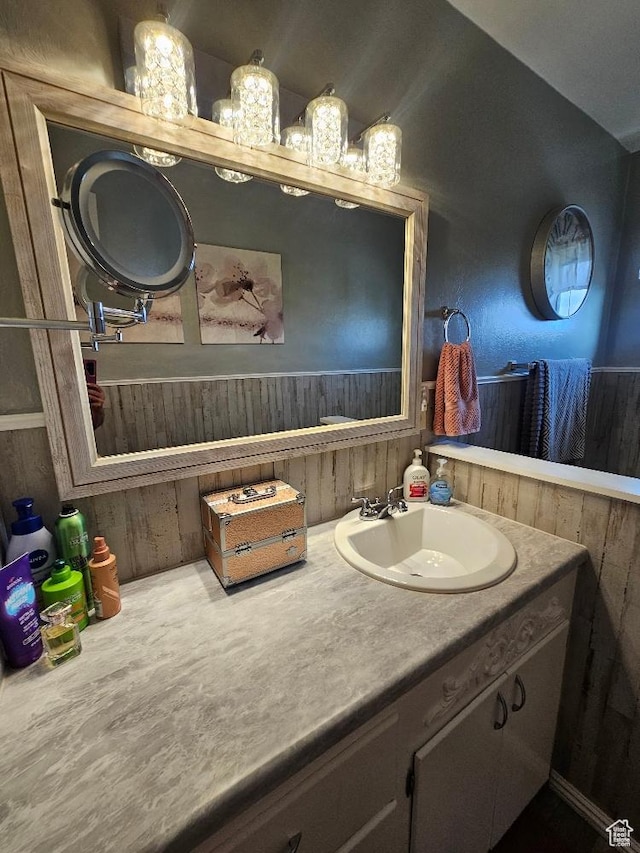 675 W 3300 N, Vernal, UT 84078 - bathroom featuring vanity and wood walls