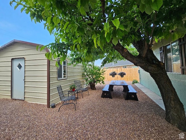 675 W 3300 N, Vernal, UT 84078 - fenced backyard with an outdoor structure and outdoor dining area