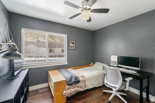 1332 S 1400 E, Provo, UT 84606 - bedroom featuring dark wood-type flooring, a textured ceiling, and a ceiling fan