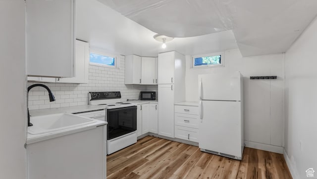 720 N 1200 E, Provo, UT 84606 - kitchen featuring freestanding refrigerator, electric range, black microwave, and plenty of natural light