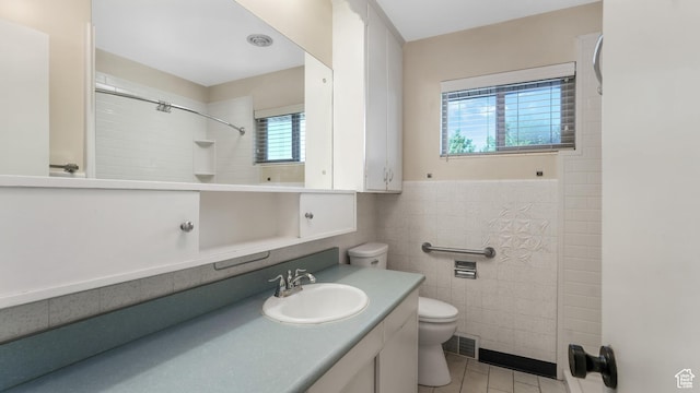 720 N 1200 E, Provo, UT 84606 - full bath featuring vanity, tile walls, tile patterned floors, and a shower