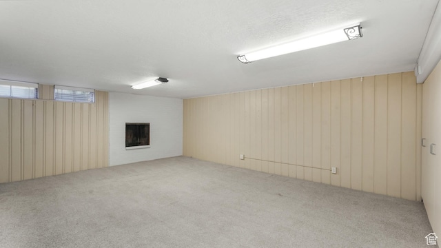 720 N 1200 E, Provo, UT 84606 - below grade area with carpet, a fireplace, and wooden walls