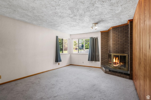 222 S 800 E, Alpine, UT 84004 - unfurnished living room featuring carpet, a fireplace, and a textured ceiling