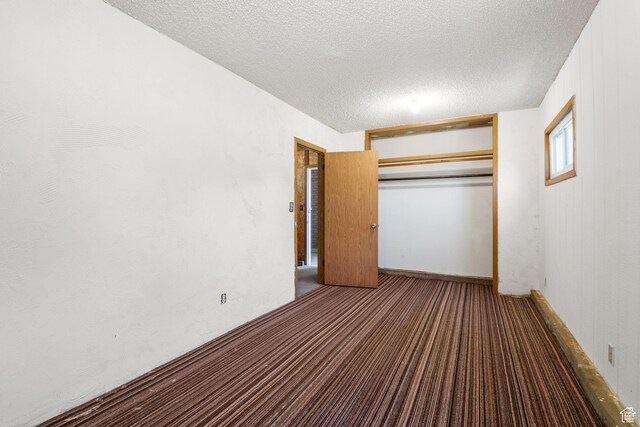 222 S 800 E, Alpine, UT 84004 - unfurnished bedroom with carpet flooring, a textured ceiling, and a closet