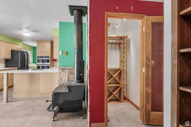 222 S 800 E, Alpine, UT 84004 - hallway with light tile patterned floors and a textured ceiling