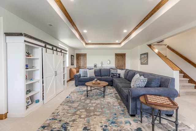 1085 W Links Dr, Midway, UT 84049 - living room with a barn door, recessed lighting, a tray ceiling, stairs, and ornamental molding