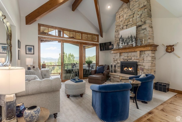 1085 W Links Dr, Midway, UT 84049 - living area featuring beamed ceiling, a stone fireplace, high vaulted ceiling, and wood finished floors