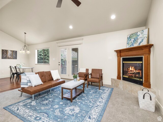 179 S 1060 E, American Fork, UT 84003 - carpeted living area featuring vaulted ceiling, a fireplace, a ceiling fan, a chandelier, and recessed lighting