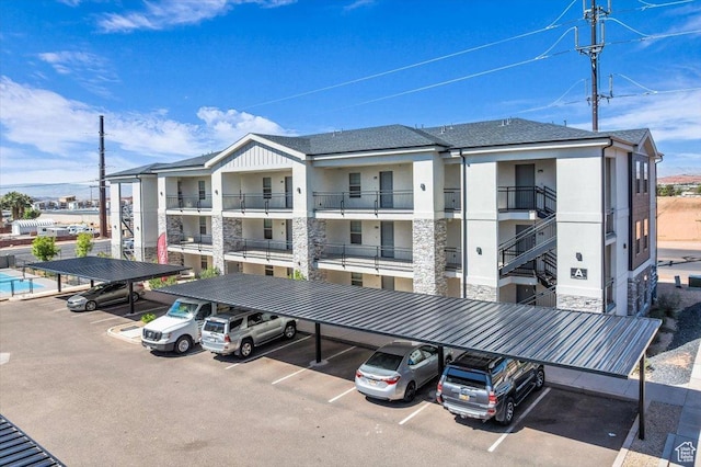 1167 E Telegraph St # A104, Washington, UT 84780 - view of building exterior with covered parking