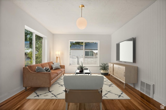 1114 W Briarcliff Ave S, Salt Lake City, UT 84116 - living room featuring healthy amount of natural light and wood finished floors