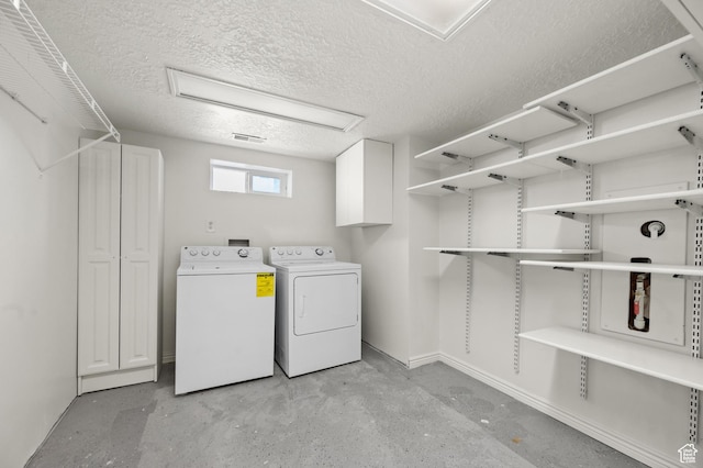 1114 W Briarcliff Ave S, Salt Lake City, UT 84116 - washroom featuring washing machine and clothes dryer and a textured ceiling