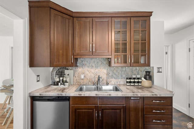 1114 W Briarcliff Ave S, Salt Lake City, UT 84116 - kitchen featuring dishwasher, backsplash, light countertops, and glass insert cabinets