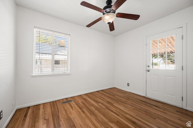 1114 W Briarcliff Ave S, Salt Lake City, UT 84116 - empty room with wood finished floors and ceiling fan