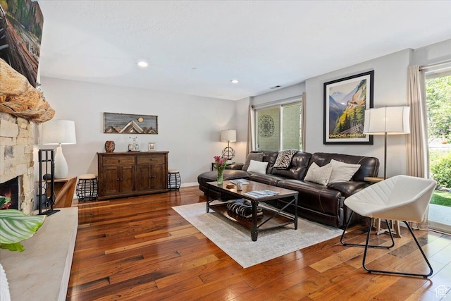 435 Aspen Dr Unit 8, Park City, UT 84098 - living room with hardwood / wood-style flooring, a stone fireplace, and recessed lighting