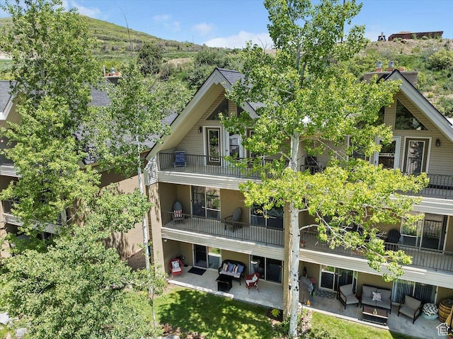 435 Aspen Dr Unit 8, Park City, UT 84098 - back of house with an outdoor living space, a patio, and a balcony
