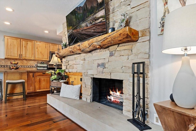 435 Aspen Dr Unit 8, Park City, UT 84098 - living room with a stone fireplace, recessed lighting, and dark wood finished floors