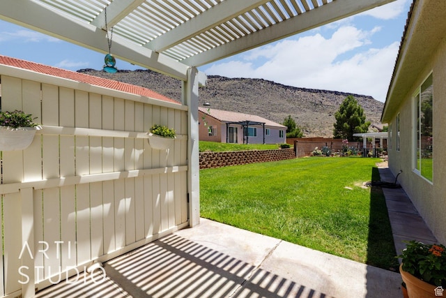 524 S Indian Hills Dr Unit 102, St George, UT 84770 - view of yard featuring a mountain view and a pergola
