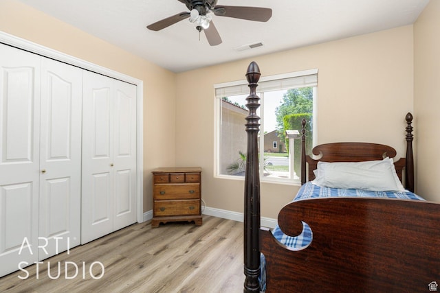 524 S Indian Hills Dr Unit 102, St George, UT 84770 - bedroom with light wood finished floors, a closet, and a ceiling fan