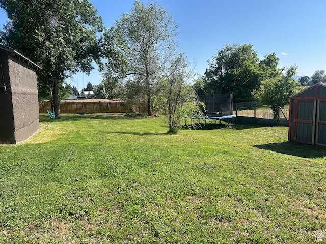 228 S 2 W, Preston, ID 83263 - fenced backyard with a trampoline and a shed