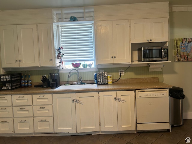 228 S 2 W, Preston, ID 83263 - kitchen featuring white dishwasher, stainless steel microwave, white cabinets, and dark tile patterned flooring