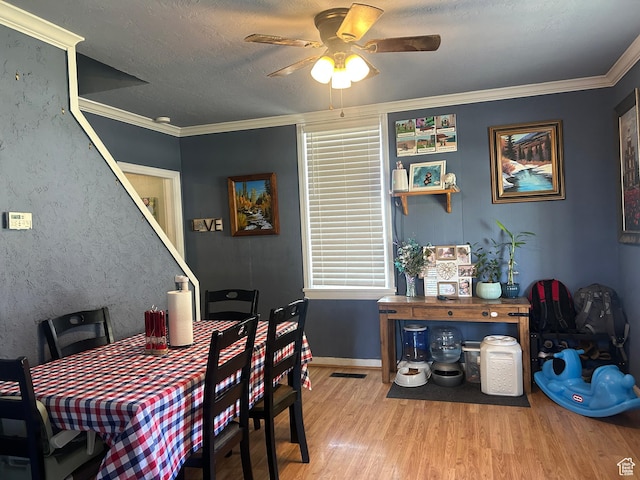 228 S 2 W, Preston, ID 83263 - dining area featuring ceiling fan, wood finished floors, crown molding, and a textured ceiling