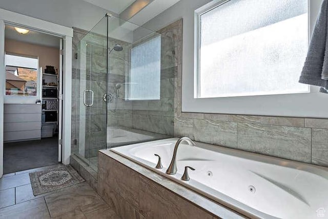 735 W Horizon Dr, Lehi, UT 84043 - full bath featuring a shower stall, a tub with jets, a walk in closet, and tile patterned floors
